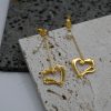 gold plated earrings with freshwater pearls and hanging hearts, hearts charms earrings, charms in heart shape, long earrings, handmade gold designs, handmade gold creations.