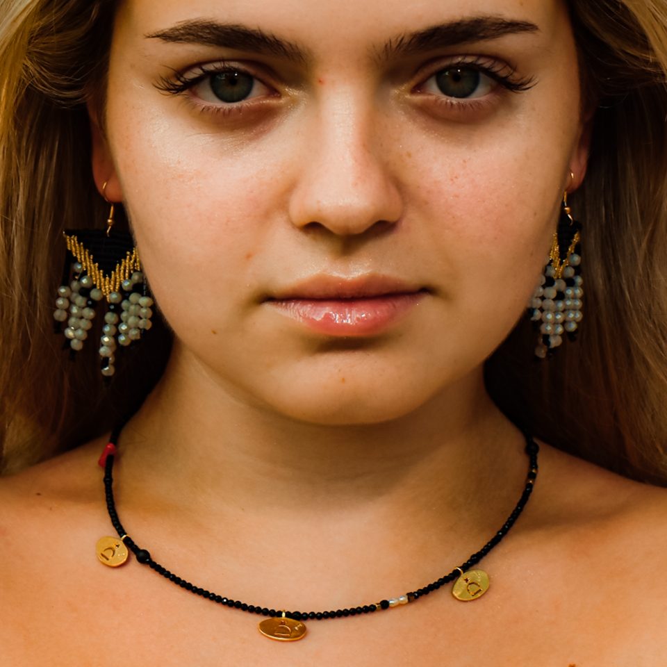 Handmade Hrha necklace, made with the semi-precious stone of black onyx and 24K gold plated leaves with the ancient Greek symbol of the Goddess "Hrha".