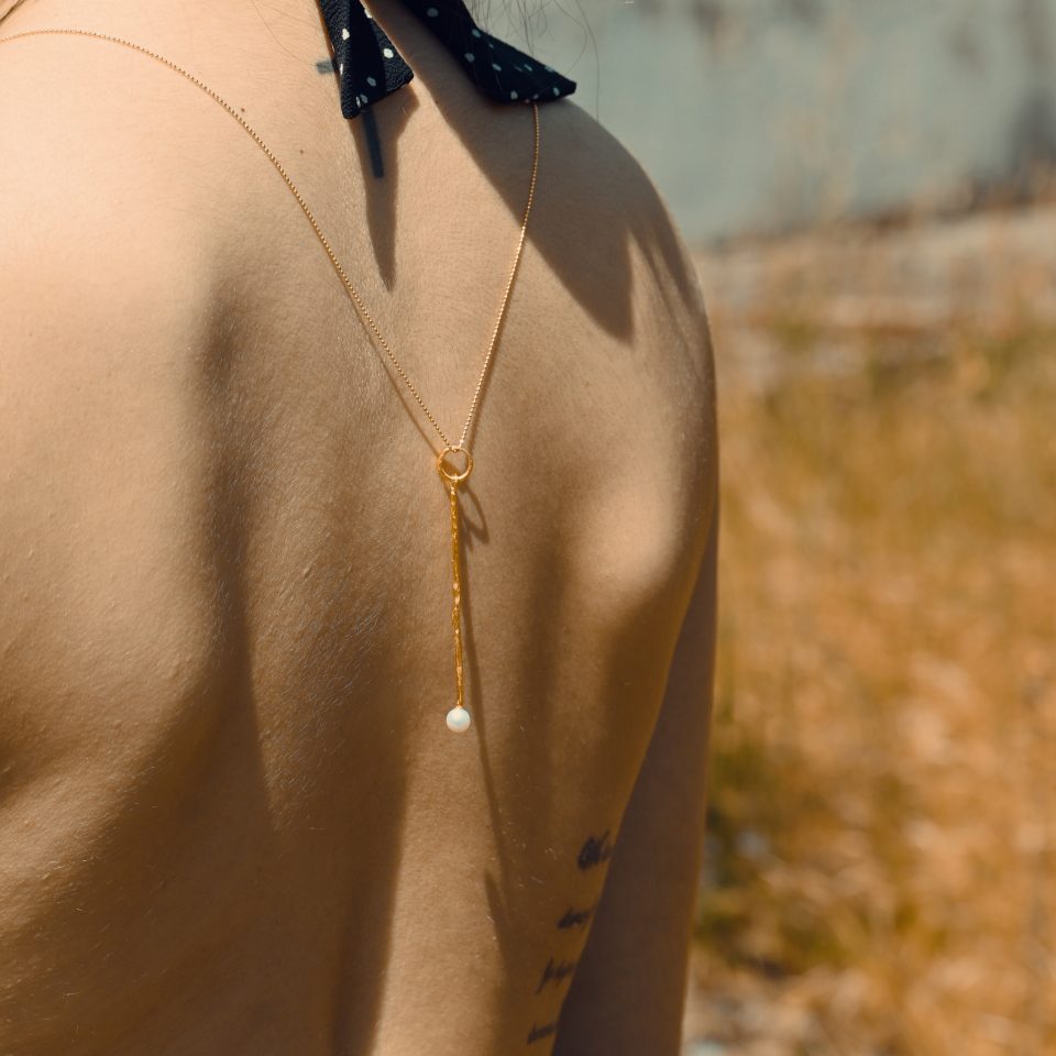 minimalist pearl drop pendant in 24K gold plated silver, handcrafted in a Greek workshop by the Greek designer Marianna Melliou, handmade gold plated necklace, handmade gold plated pendant, freshwater pearl jewelry, elegant jewelry set, minimalist pearl drop jewelry set, minimalist pearl drop earrings and pendant, handmade creations, timeless creations, elegant creations.