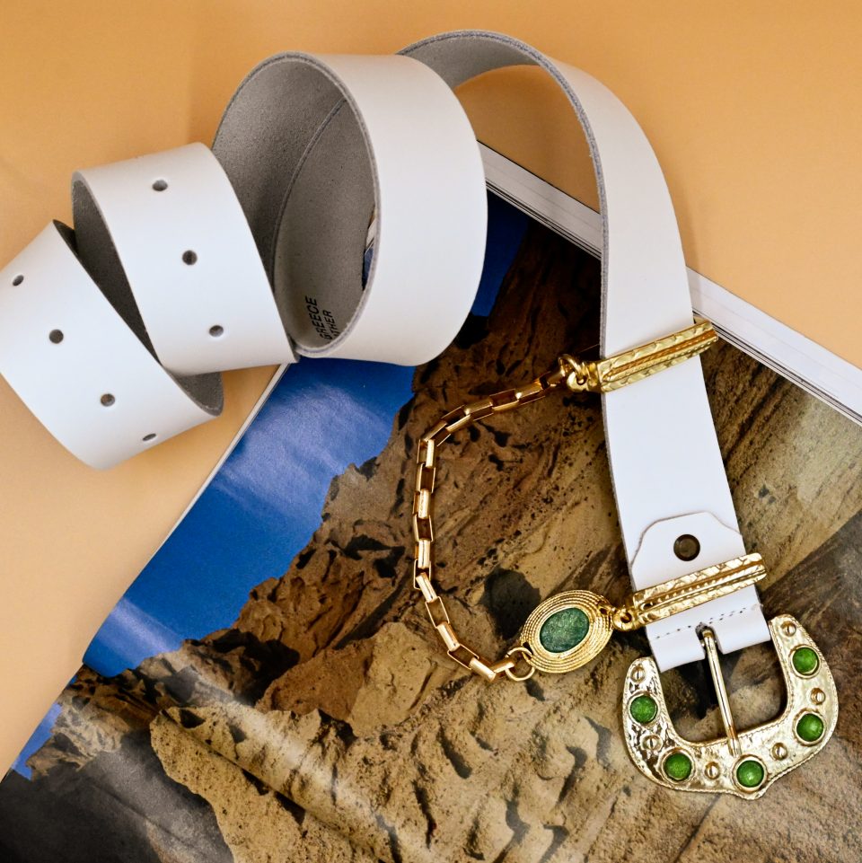 tinkerbell's leather belt with gold charms and emerald gems, summer trends, summer genuine leather belts, statement belts, statement buckles, chain belts, handmade genuine leather creations, handmade leather accessories.