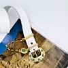 tinkerbell's leather belt with gold charms and emerald gems, summer trends, summer genuine leather belts, statement belts, statement buckles, chain belts, handmade genuine leather creations, handmade leather accessories.
