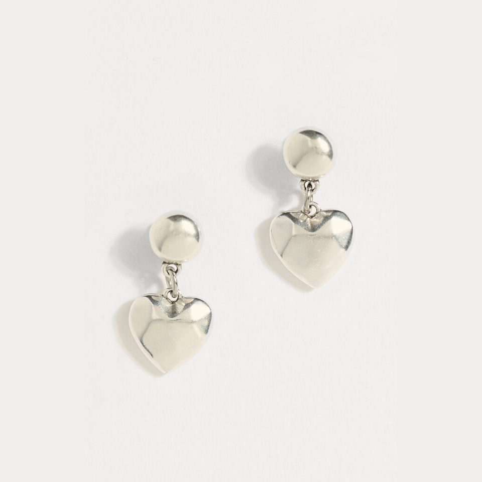 Ηandmade Posh Earrings made of stainless steel in silver color and silver plated pendants in heart shape. Your choice in modern jewelry! care intsructions for steel jewelry included