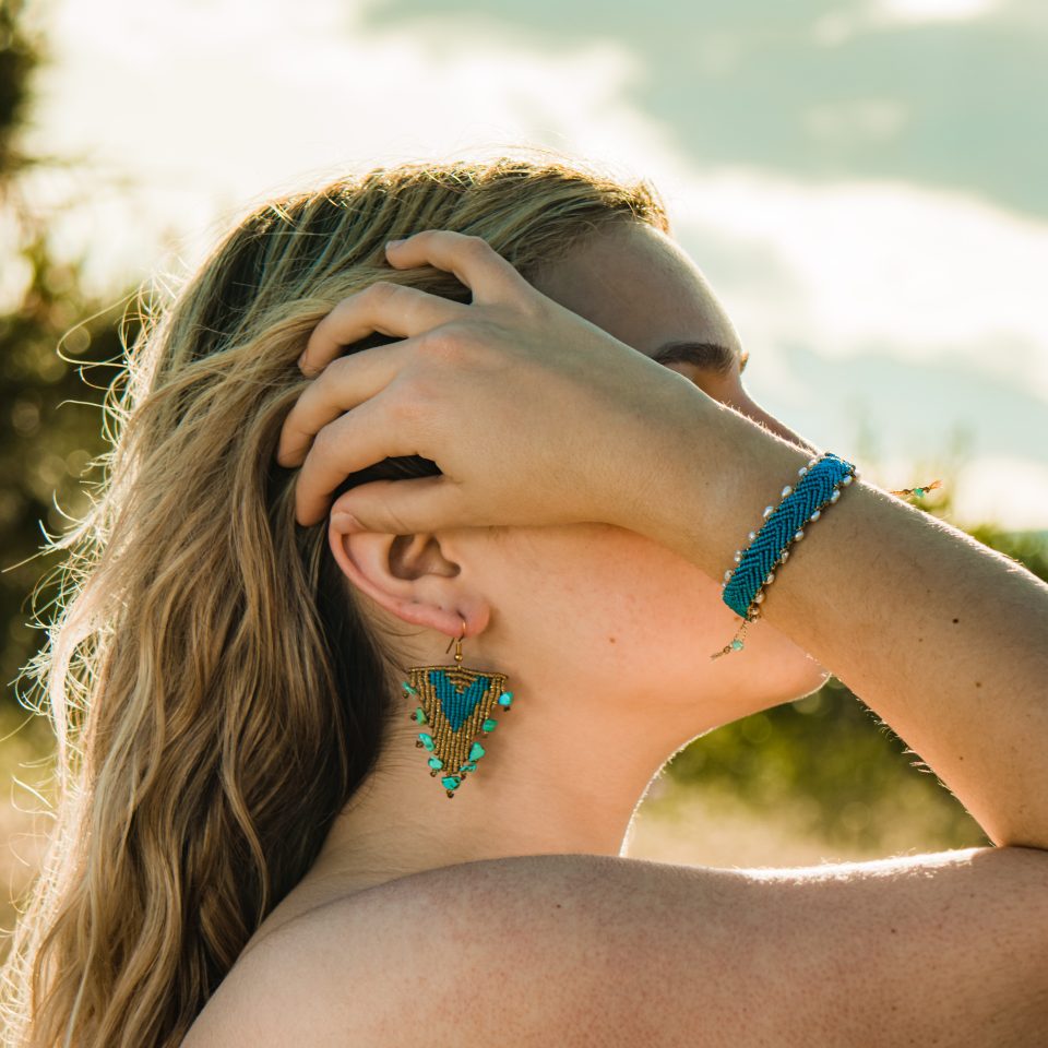 Boho-chic greek-inspired turquoise macrame earrings featuring a geometric pattern and natural turquoise stones , perfect for spring and summer season.