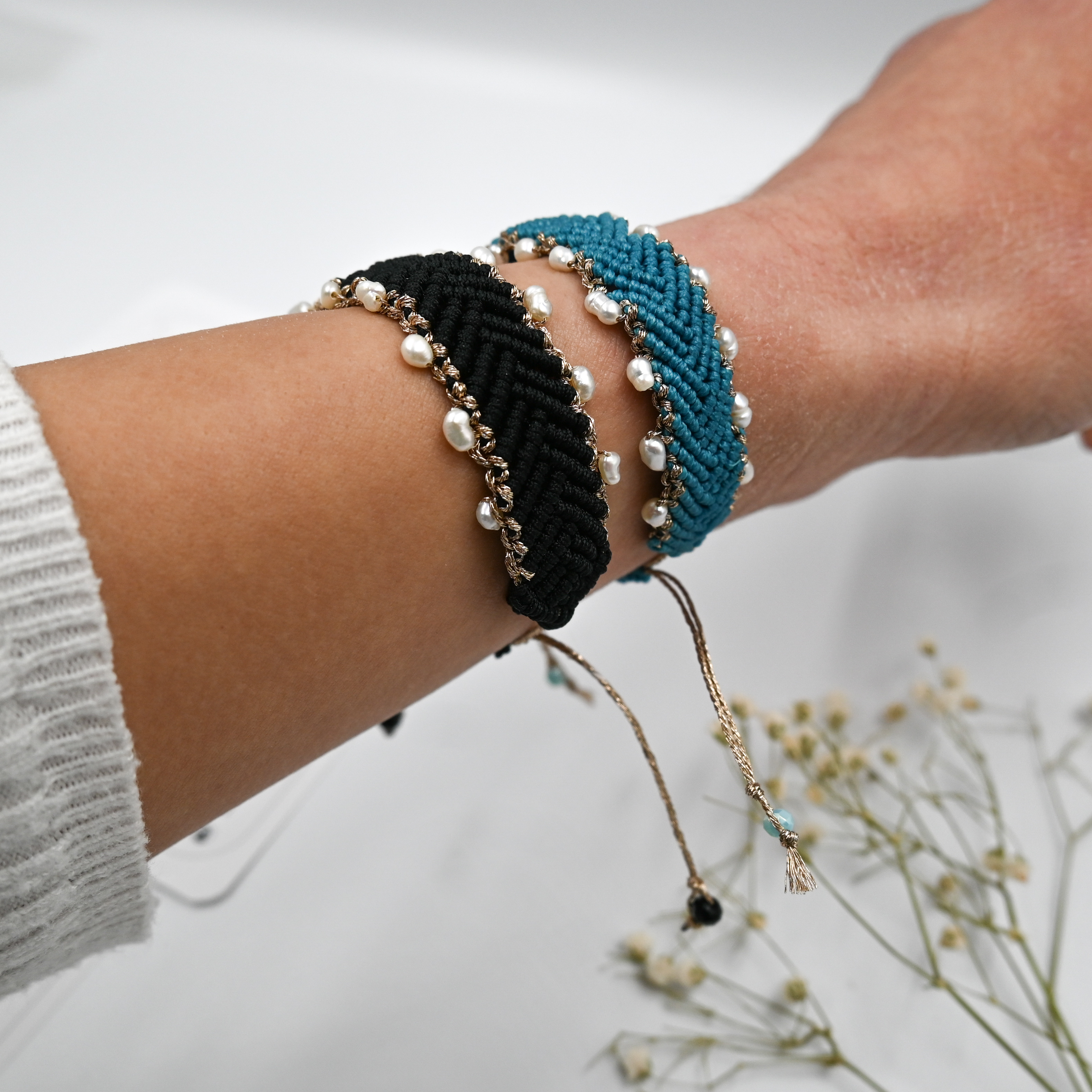 Handmade bohemian turquoise macramé bracelet with freshwater pearls and herringbone braid. Crafted in Greece using eco-friendly, sustainable materials, symbolizing good luck and success.