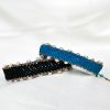 Handmade bohemian black macramé bracelet with freshwater pearls and herringbone braid. Crafted in Greece using eco-friendly, sustainable materials, symbolizing good luck and success.