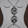 The Seraphine Harness Body Chain in stainless steel with silver plating, features bold interlocking links — the ultimate statement piece of strength and sensuality.