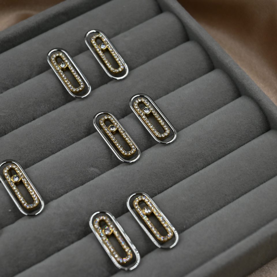 Discover our Luxe Zircon Bar Earrings, a viral jewelry trend with gold-plated zircon bar, steel gold studs, and contemporary double-bar design for modern, statement elegance.