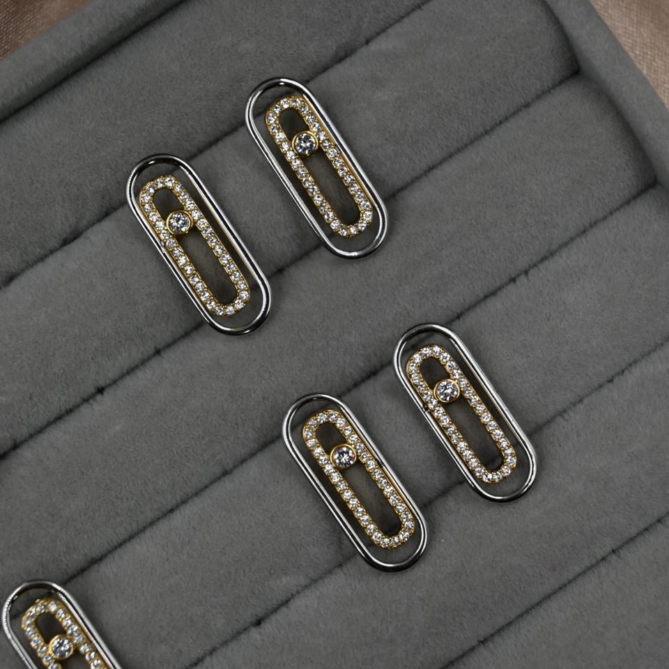 Discover our Luxe Zircon Bar Earrings, a viral jewelry trend with gold-plated zircon bar, steel gold studs, and contemporary double-bar design for modern, statement elegance.