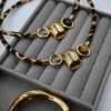 Leopard Gold-Plated Geometric Necklaces, made of stainless steel with 18-karat gold plating and leopard fabric lining. It features steel geometric designs decorated with zircon and brown resin stones with a vintage aesthetic.