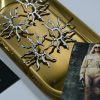 Silver sunray earrings with sculptural rays by kirki creations