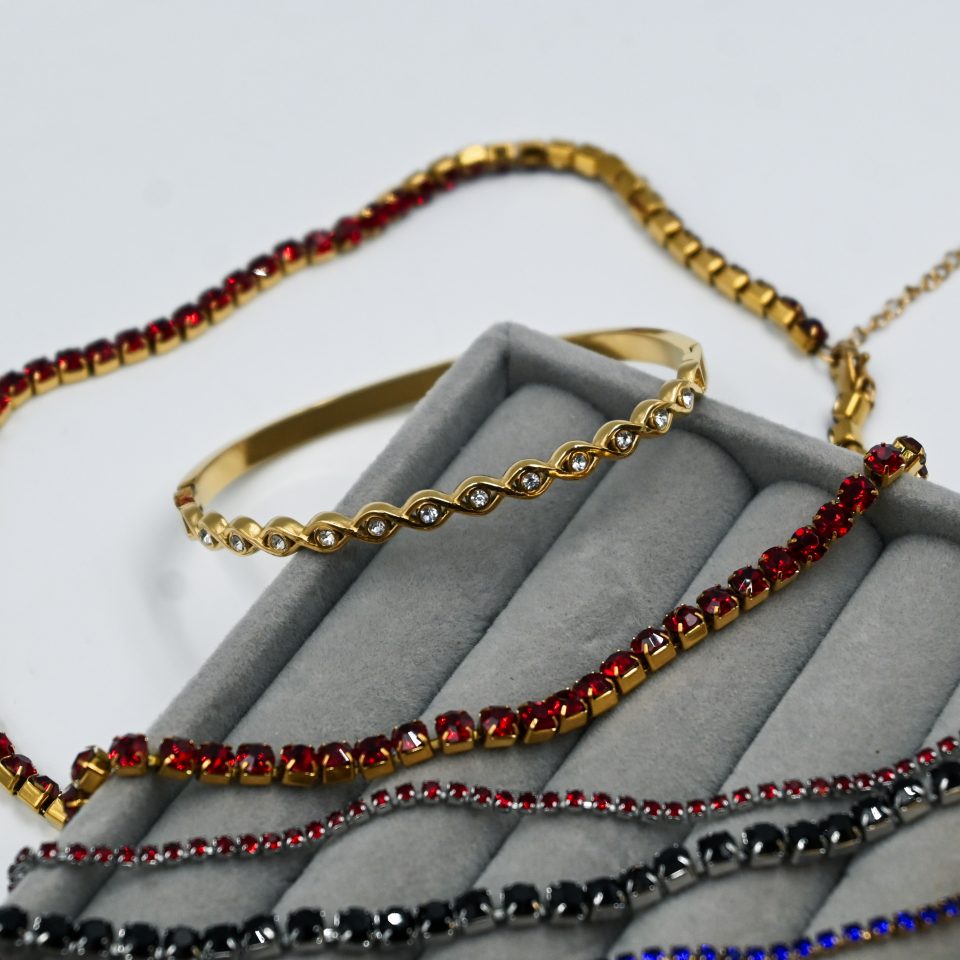 oval evil eye–inspired links adorned with shimmering zirconia.