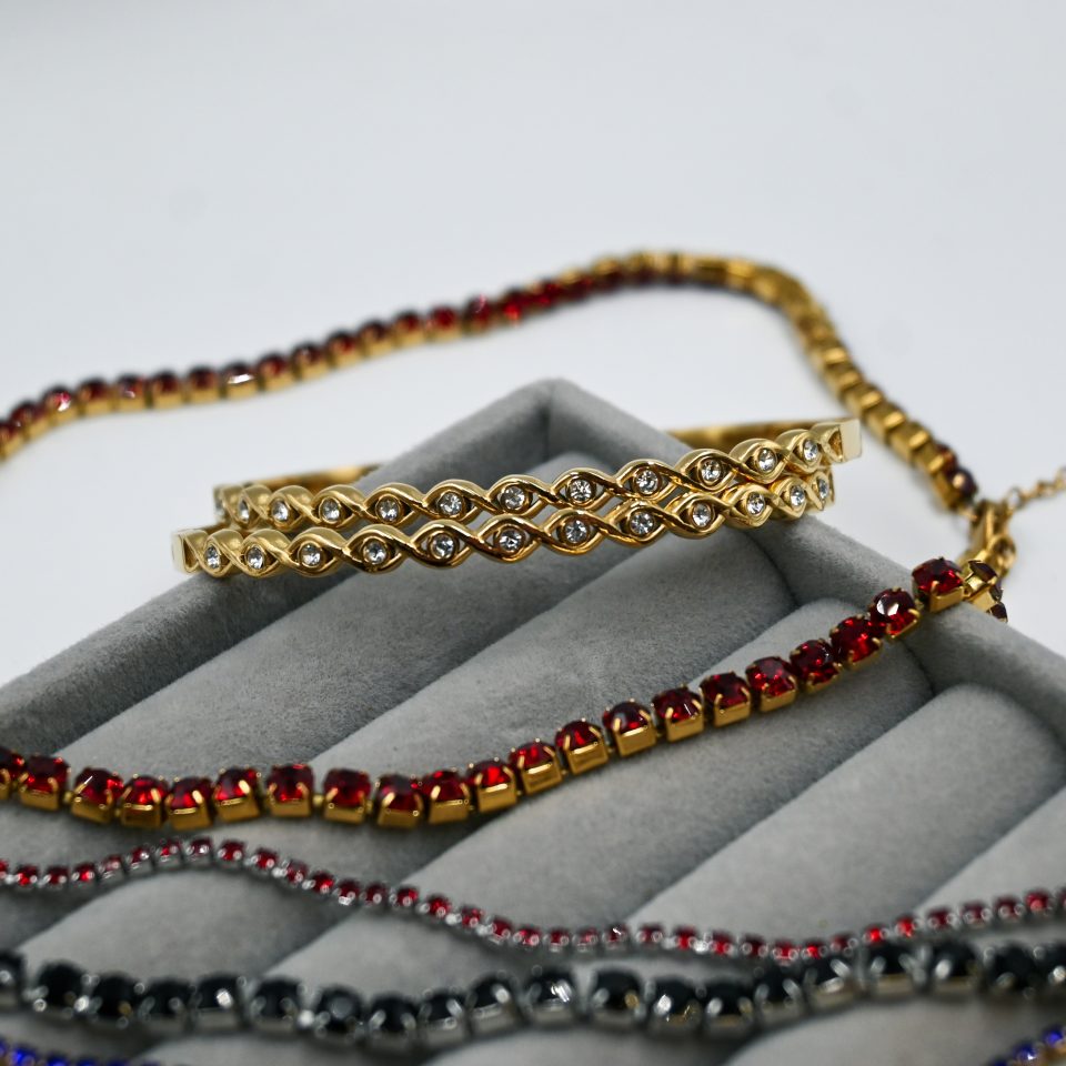 oval evil eye–inspired links adorned with shimmering zirconia.