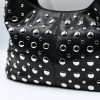 Amy black baguette bag with silver studs. Made in Italy, stylish and spacious. Perfect for everyday wear with a modern rock-chic touch.