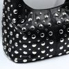 Amy black baguette bag with silver studs. Made in Italy, stylish and spacious. Perfect for everyday wear with a modern rock-chic touch.