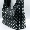 Amy black baguette bag with silver studs. Made in Italy, stylish and spacious. Perfect for everyday wear with a modern rock-chic touch.