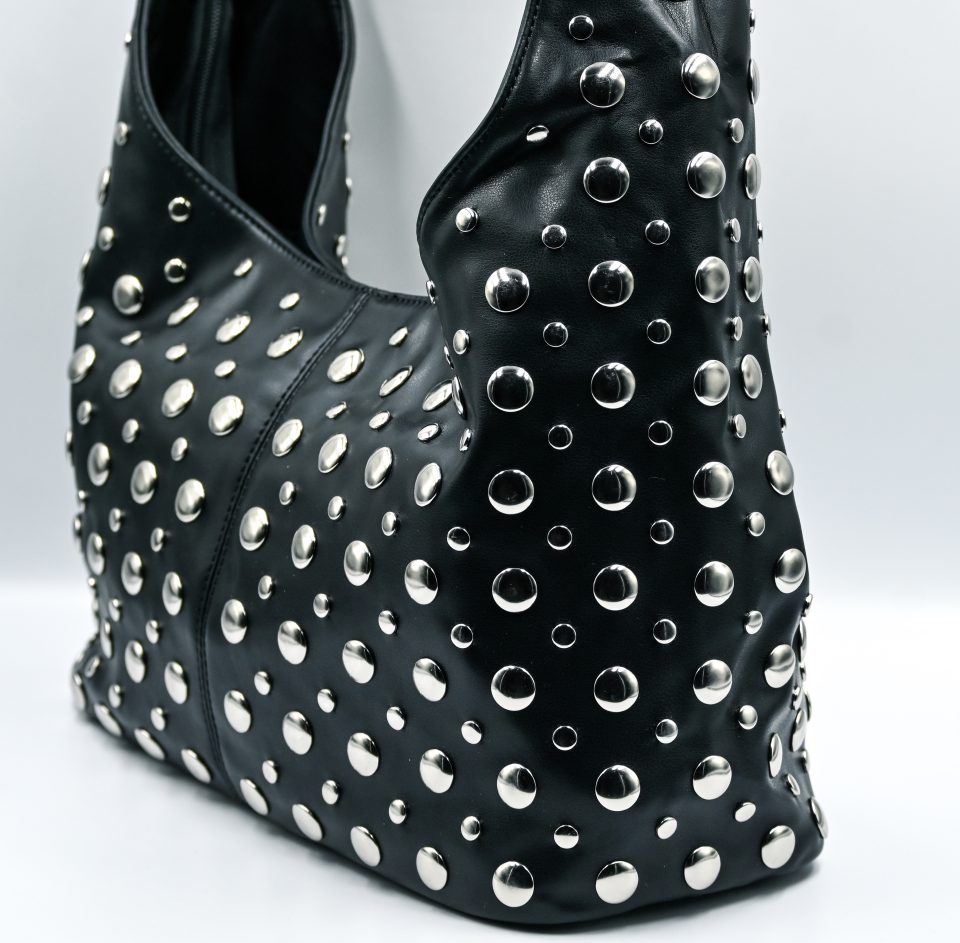 Amy black baguette bag with silver studs. Made in Italy, stylish and spacious. Perfect for everyday wear with a modern rock-chic touch.