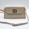 Elegant Raffaello beige shoulder bag, made in Italy from high-quality leatherette. It features a detachable leather strap in the same beige shade as the bag and adjustable length. It is adorned with gold-tone metal details and a magnetic clasp.