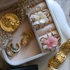Statement gold ring with floral resin centerpiece