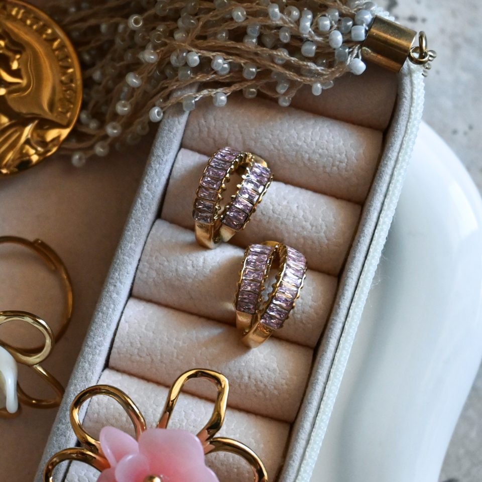 Blush pink zircon earrings in gold plated stainless steel. Elegant, feminine, and hypoallergenic. Perfect for adding soft color and sparkle to any outfit.