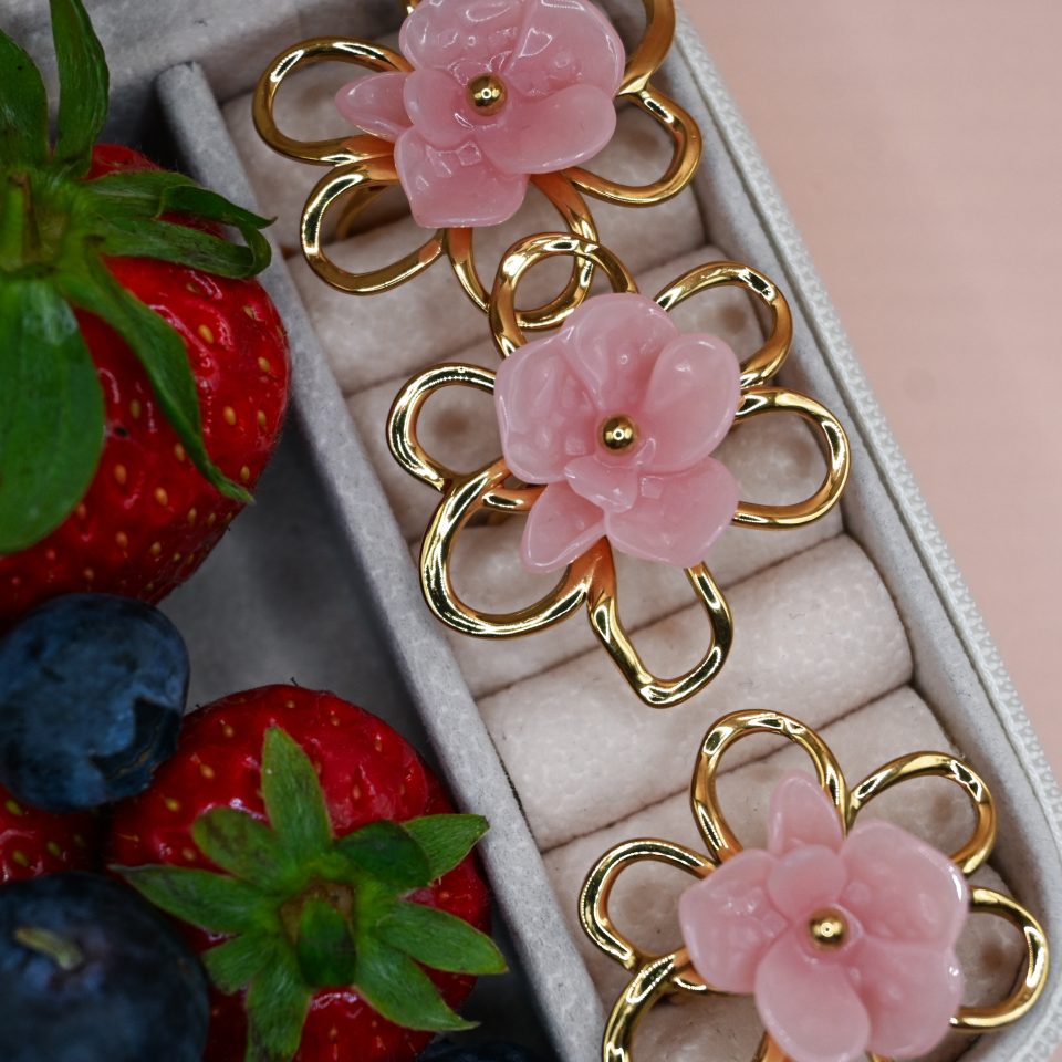 Gold flower statement ring with pink resin flower
