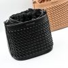 Sienna Black Bucket Bag made in Italy from woven-effect synthetic leather with detachable top handle, adjustable crossbody strap, soft drawstring closure, matching interior lining, and interior zip pocket.