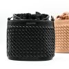 Sienna Black Bucket Bag made in Italy from woven-effect synthetic leather with detachable top handle, adjustable crossbody strap, soft drawstring closure, matching interior lining, and interior zip pocket.