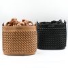 Sienna Sand Bucket Bag made in Italy from woven-effect synthetic leather with detachable top handle, adjustable crossbody strap, soft drawstring closure, matching interior lining, and interior zip pocket.
