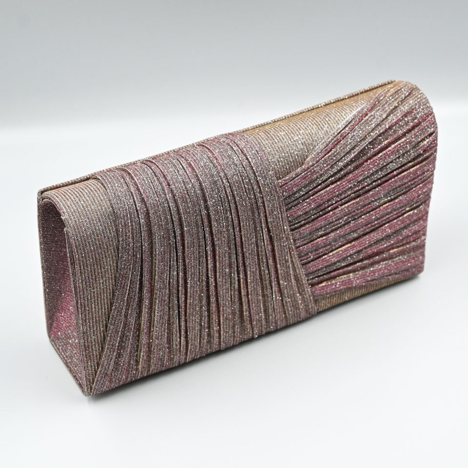 Kallisti Sparkling Pink Clutch Bag made of shimmering pink fabric with elegant front design, detachable silver chain, magnetic closure, pink lining, and interior pocket.