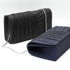 Kallisti Sparkling Black Clutch Bag in shimmering black fabric with detachable silver chain. The perfect elegant accessory for weddings and galas.